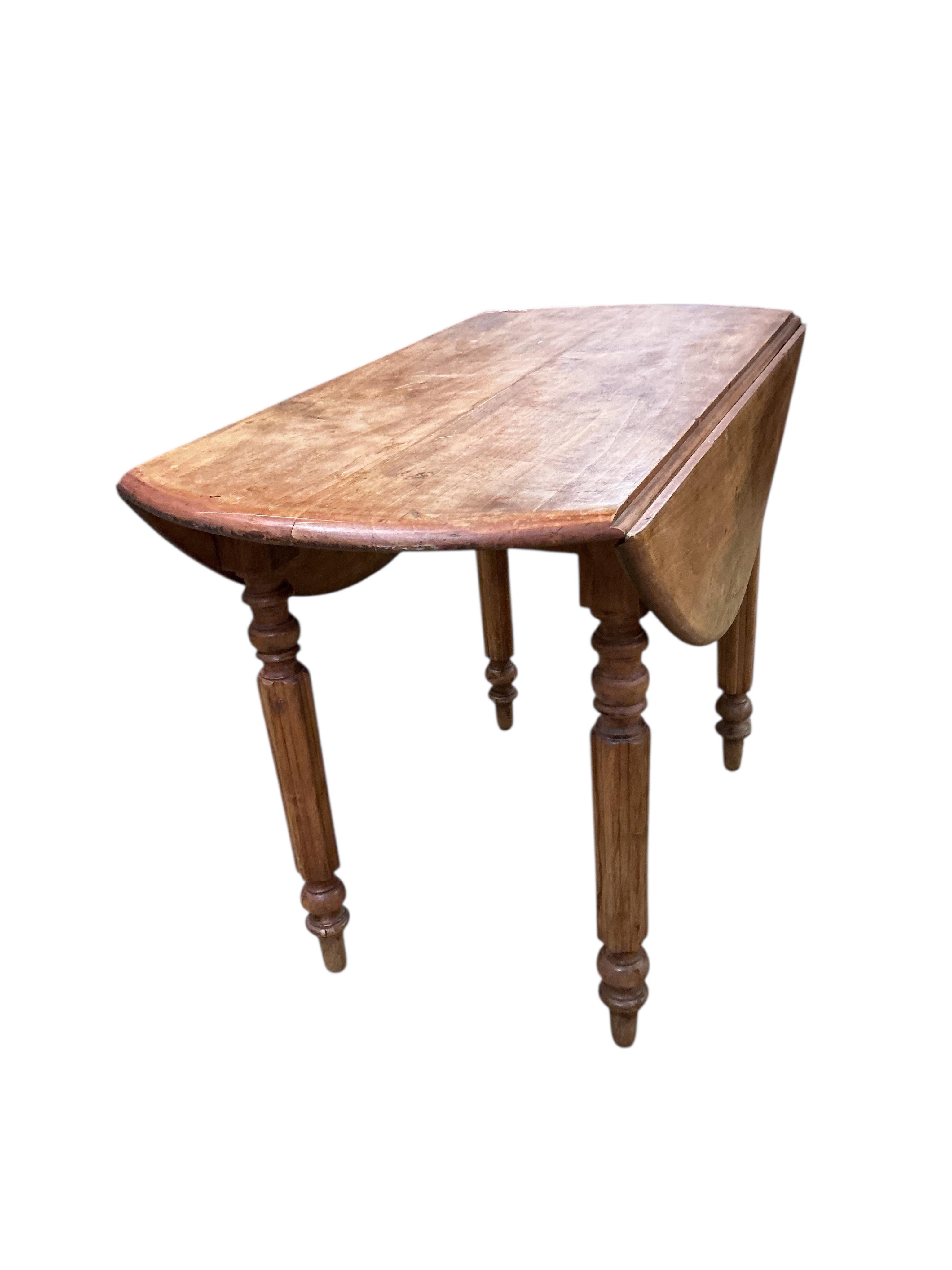 A 19th century French fruitwood drop flap table, width 98cm, depth 49cm, height 66cm